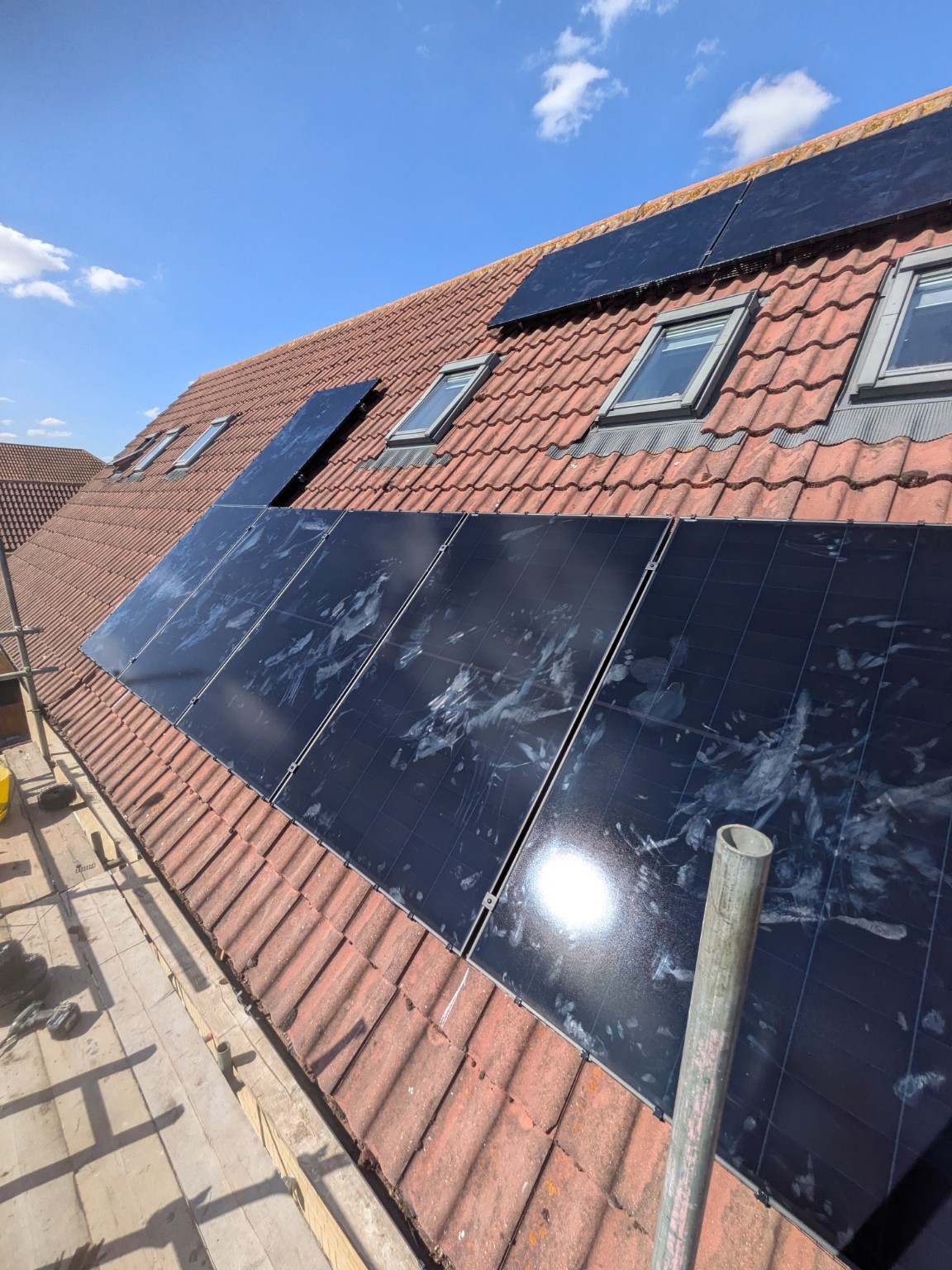 Solar panel installation on a tiled roof
