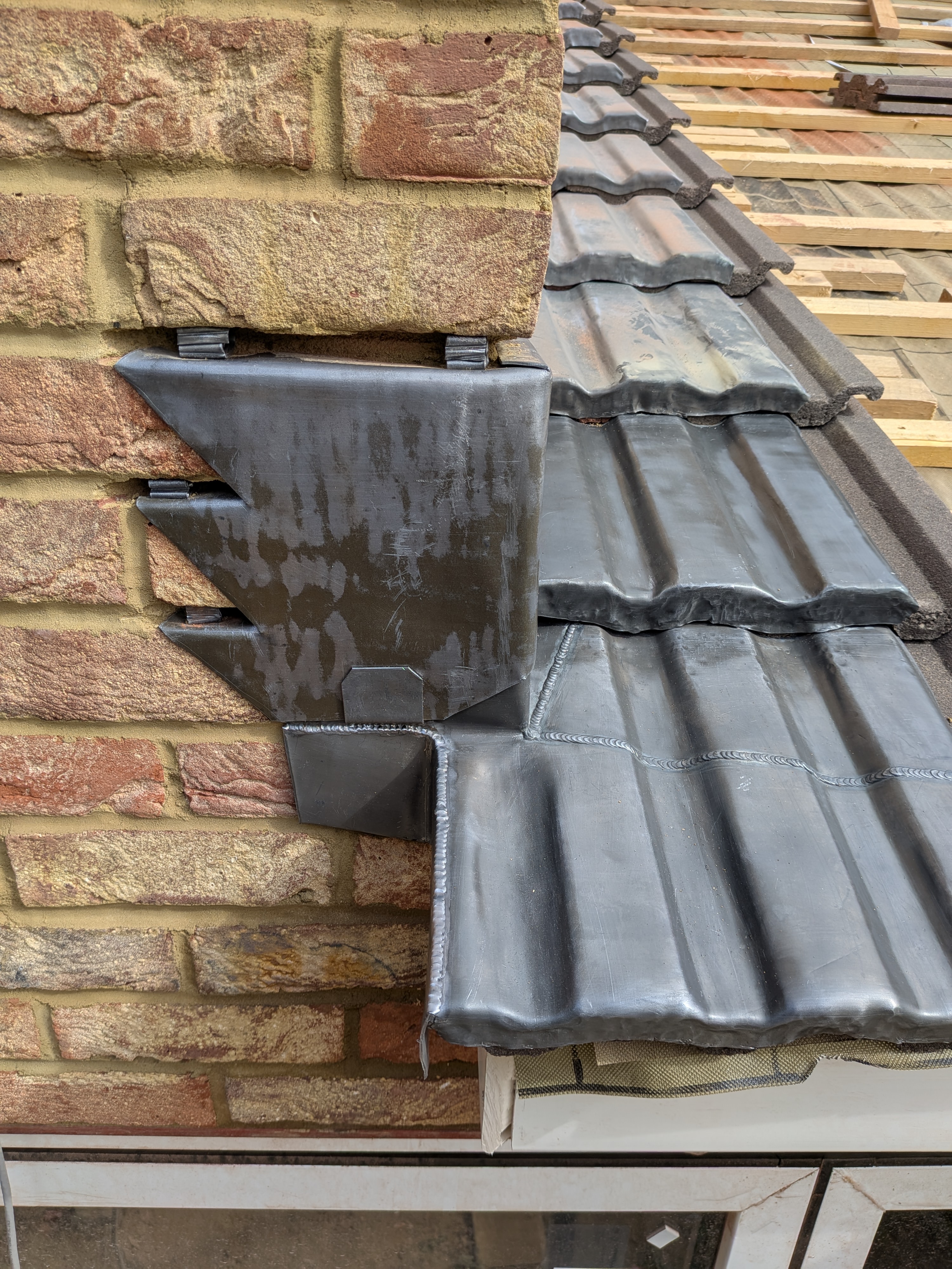 Chimney flashings on a tiled roof