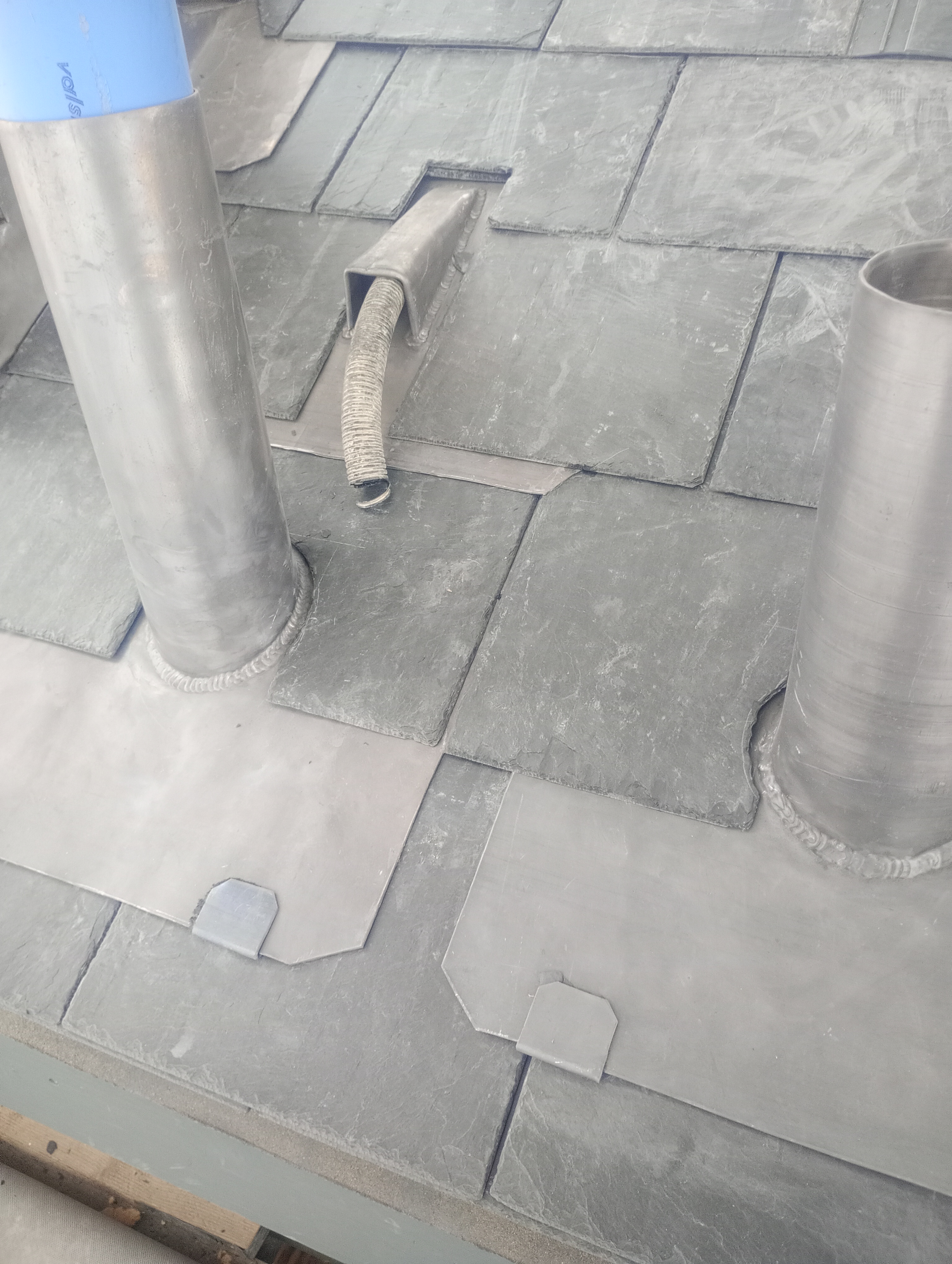Welded lead pipe flashing